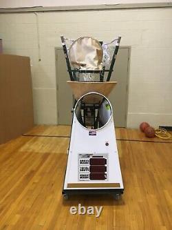 Basketball shooting/ Rebounding machine Shoot-A-Way The Gun 8000