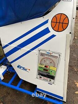 The Gun 8000 basketball shooting machine read